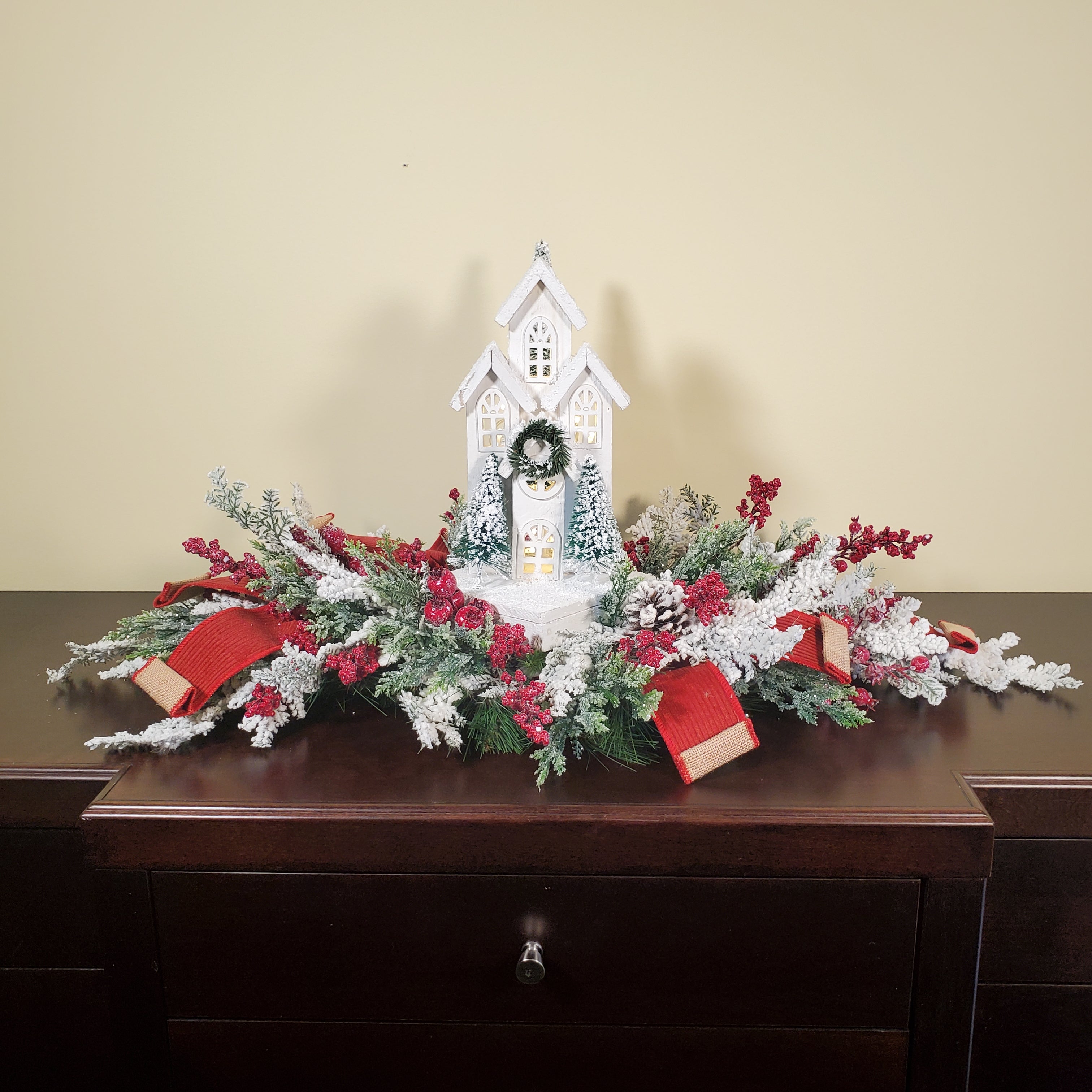 Christmas Centerpiece with White Chapel, Flocked Greenery, Red Berries & Winter Pine Accents