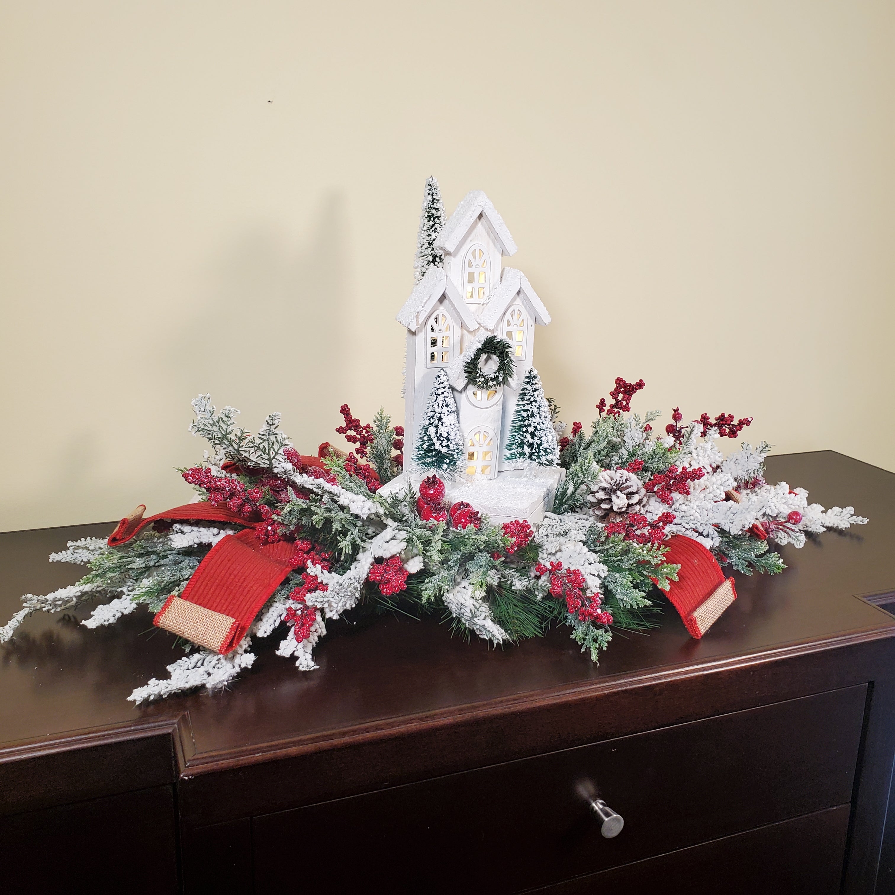 Christmas Centerpiece with White Chapel, Flocked Greenery, Red Berries & Winter Pine Accents