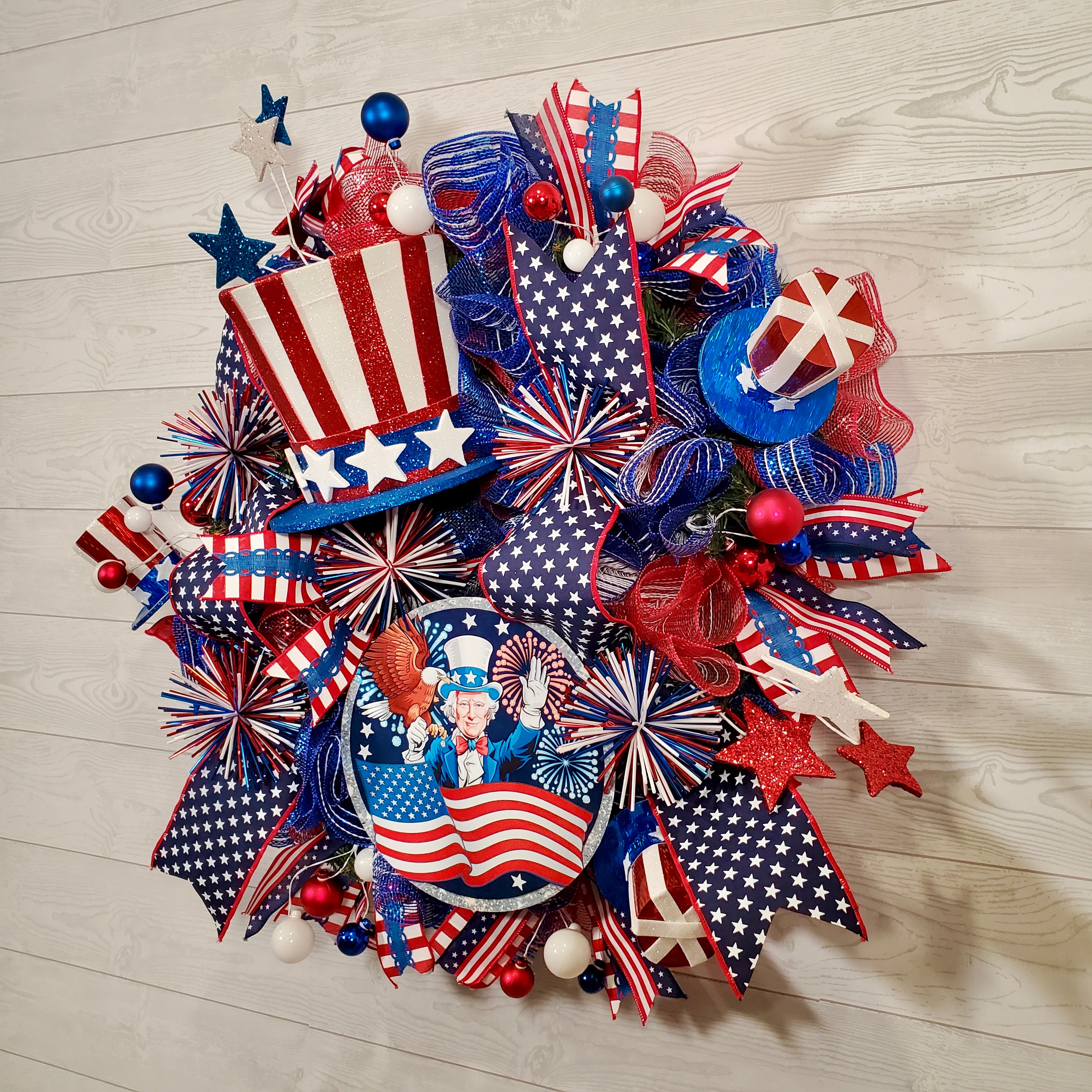 Patriotic Uncle Sam Wreath with Stars, Stripes, Fireworks Ribbons & Red White Blue Décor