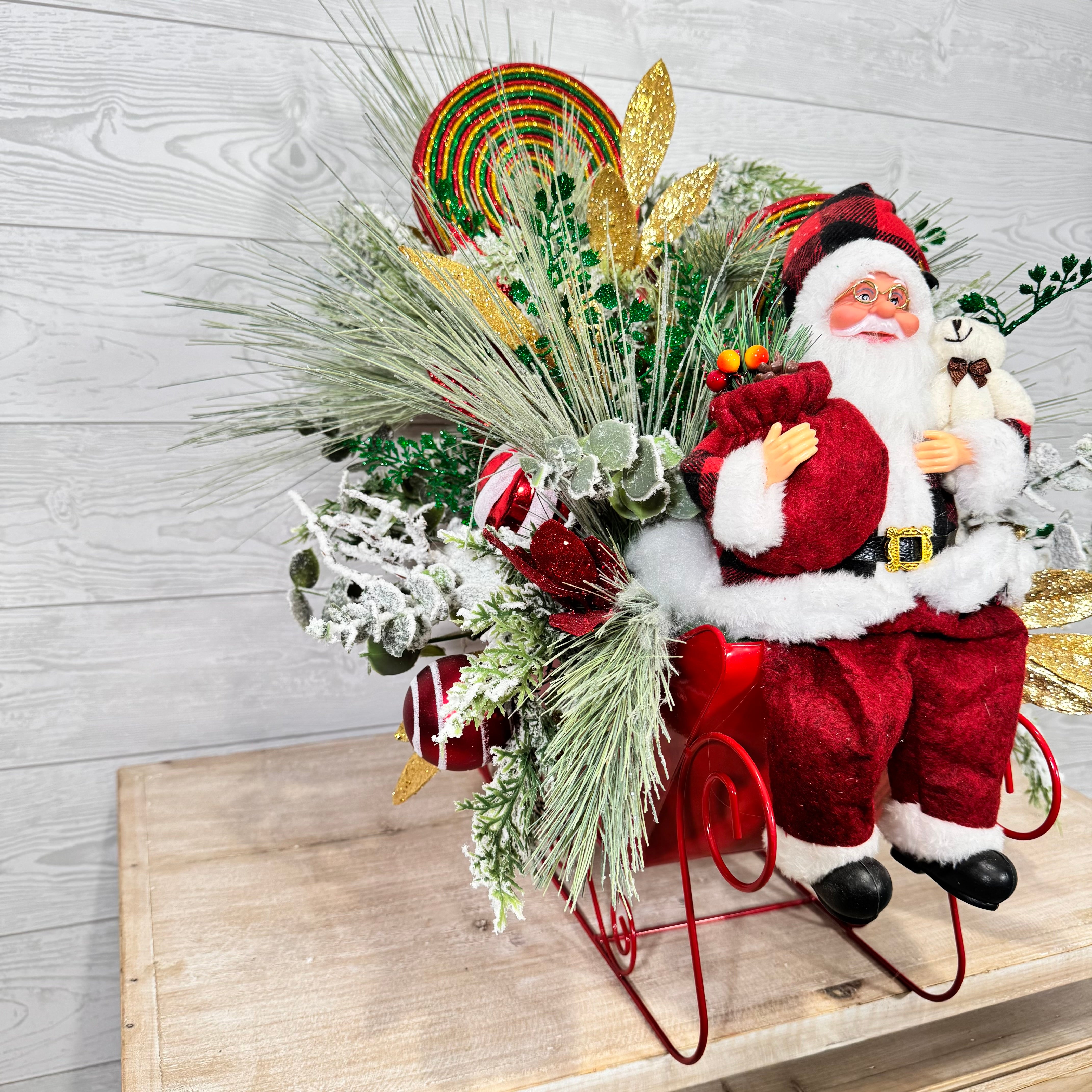 Santa Sleigh Christmas Centerpiece, Whimsical Holiday Arrangement with Plaid Santa, Lollipops & Frosted Greenery