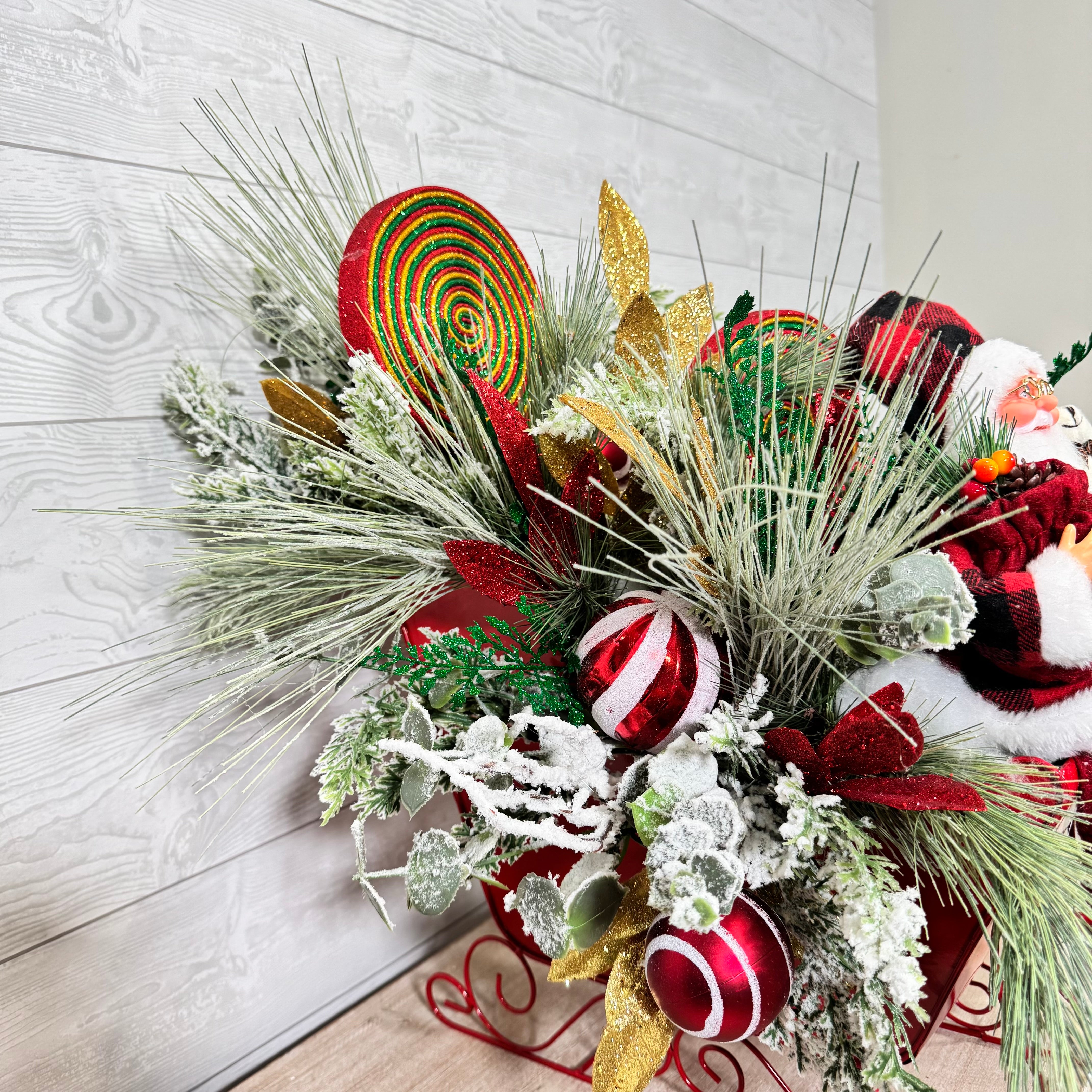 Santa Sleigh Christmas Centerpiece, Whimsical Holiday Arrangement with Plaid Santa, Lollipops & Frosted Greenery
