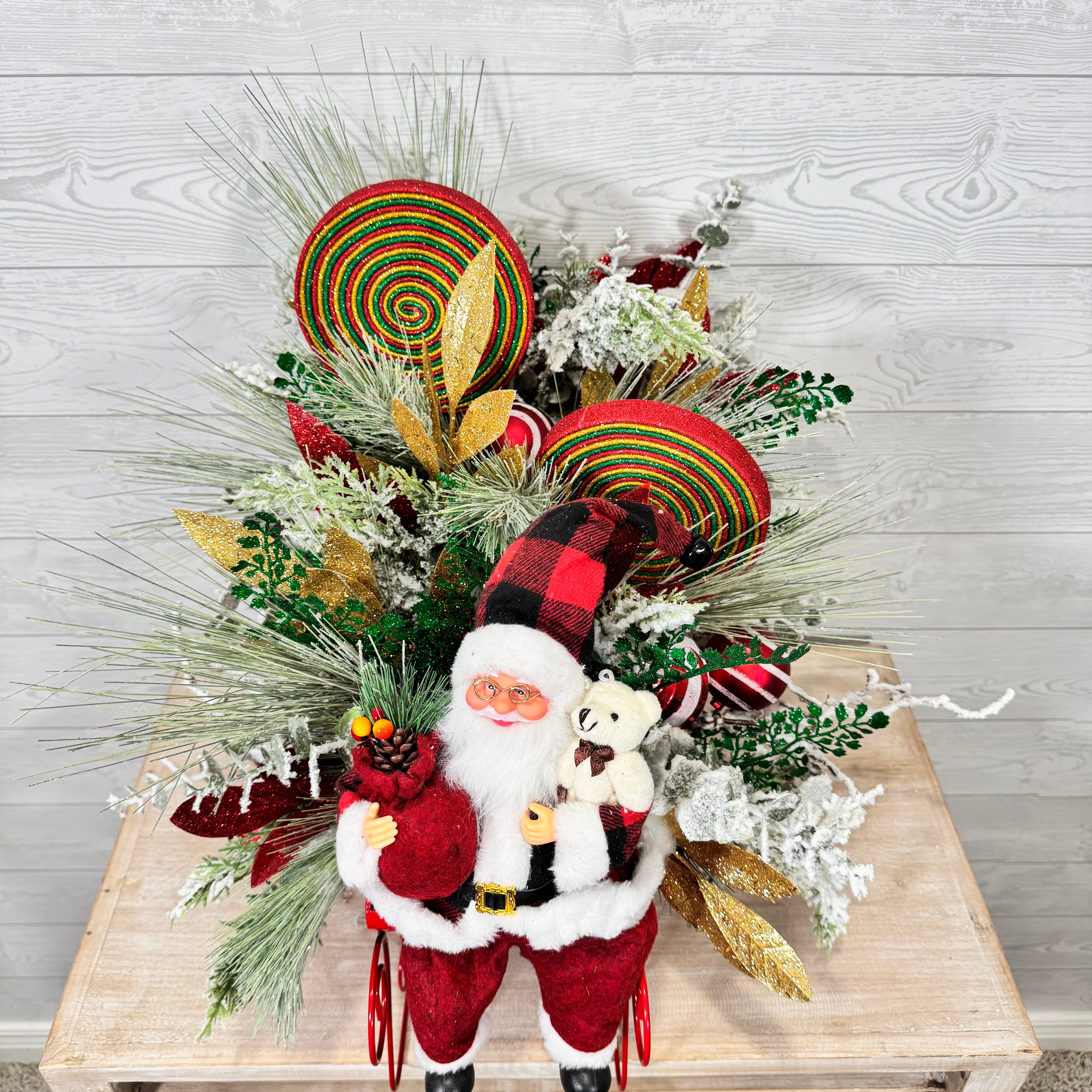 Santa Sleigh Christmas Centerpiece, Whimsical Holiday Arrangement with Plaid Santa, Lollipops & Frosted Greenery