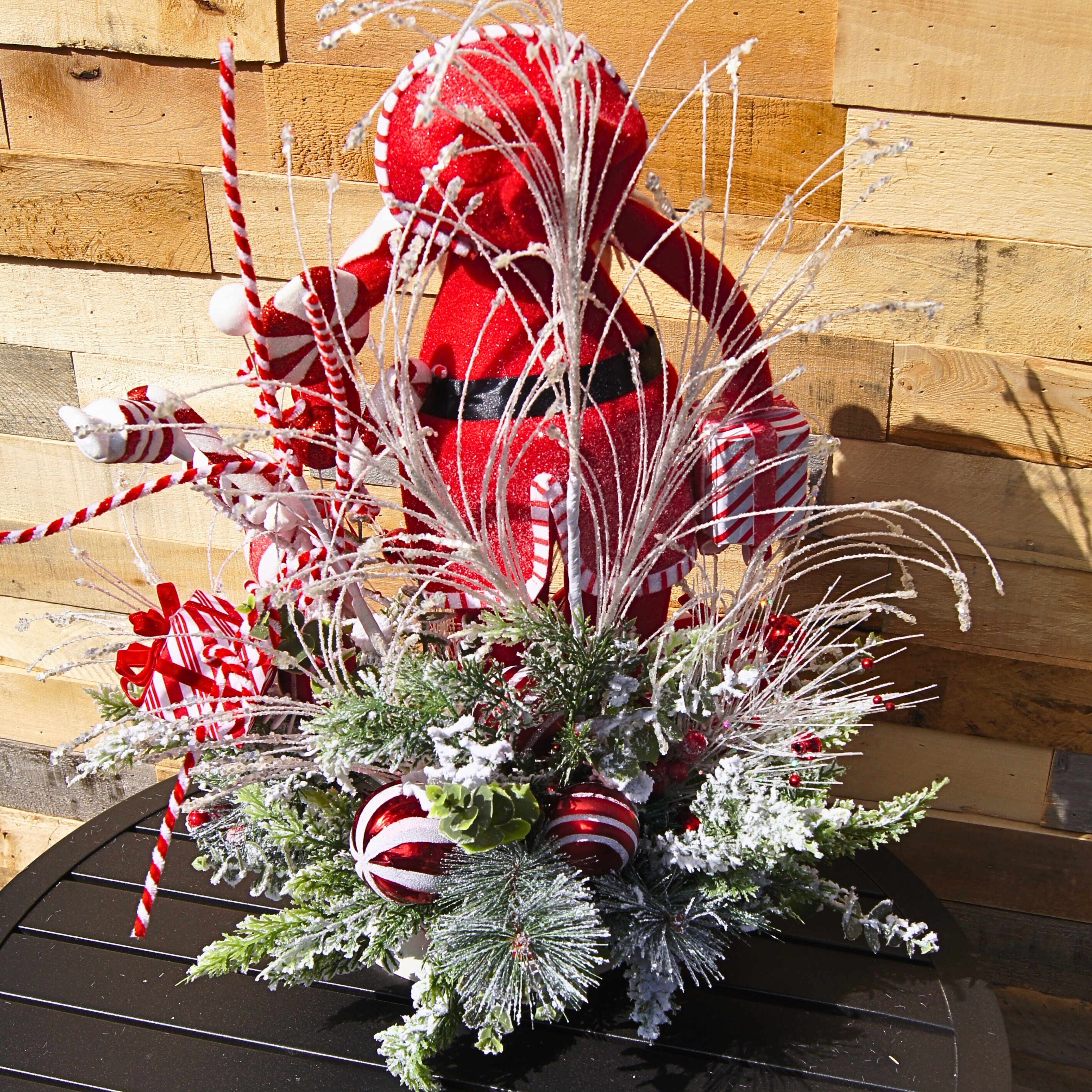 Whimsical Santa Christmas Centerpiece with Candy Cane Accents and Peppermint Gift Details
