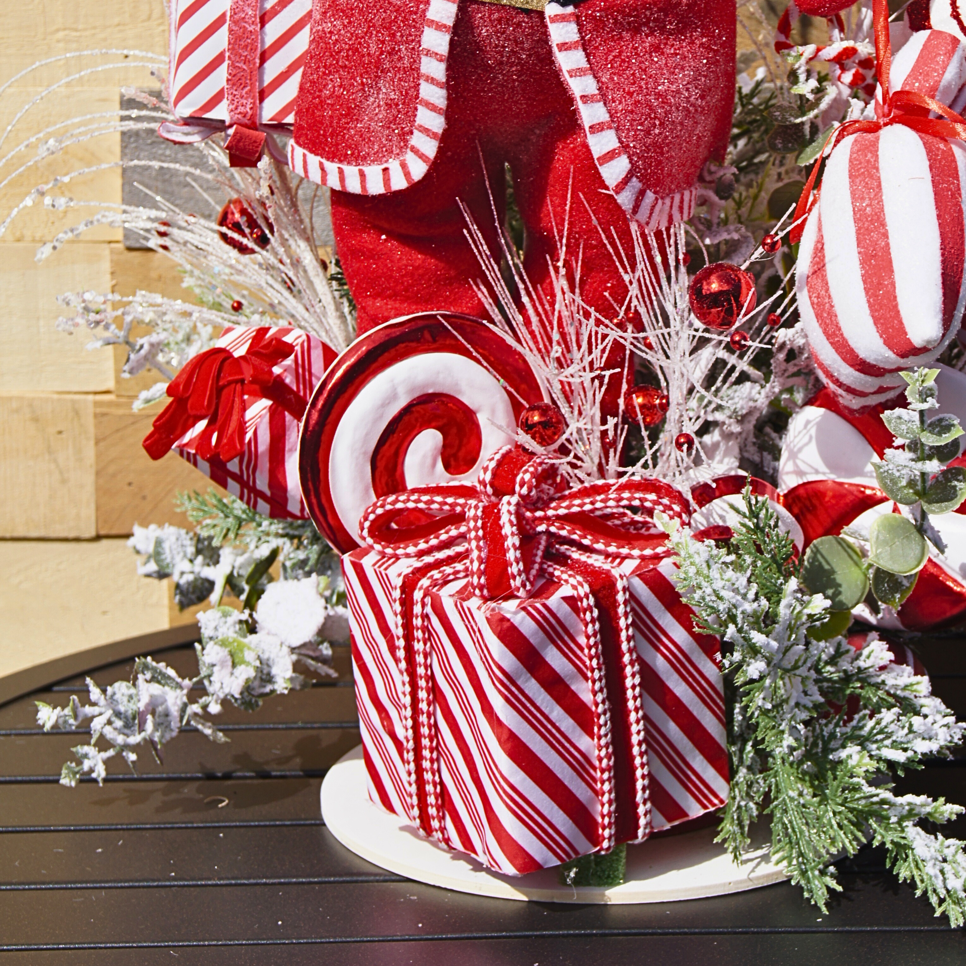 Whimsical Santa Christmas Centerpiece with Candy Cane Accents and Peppermint Gift Details