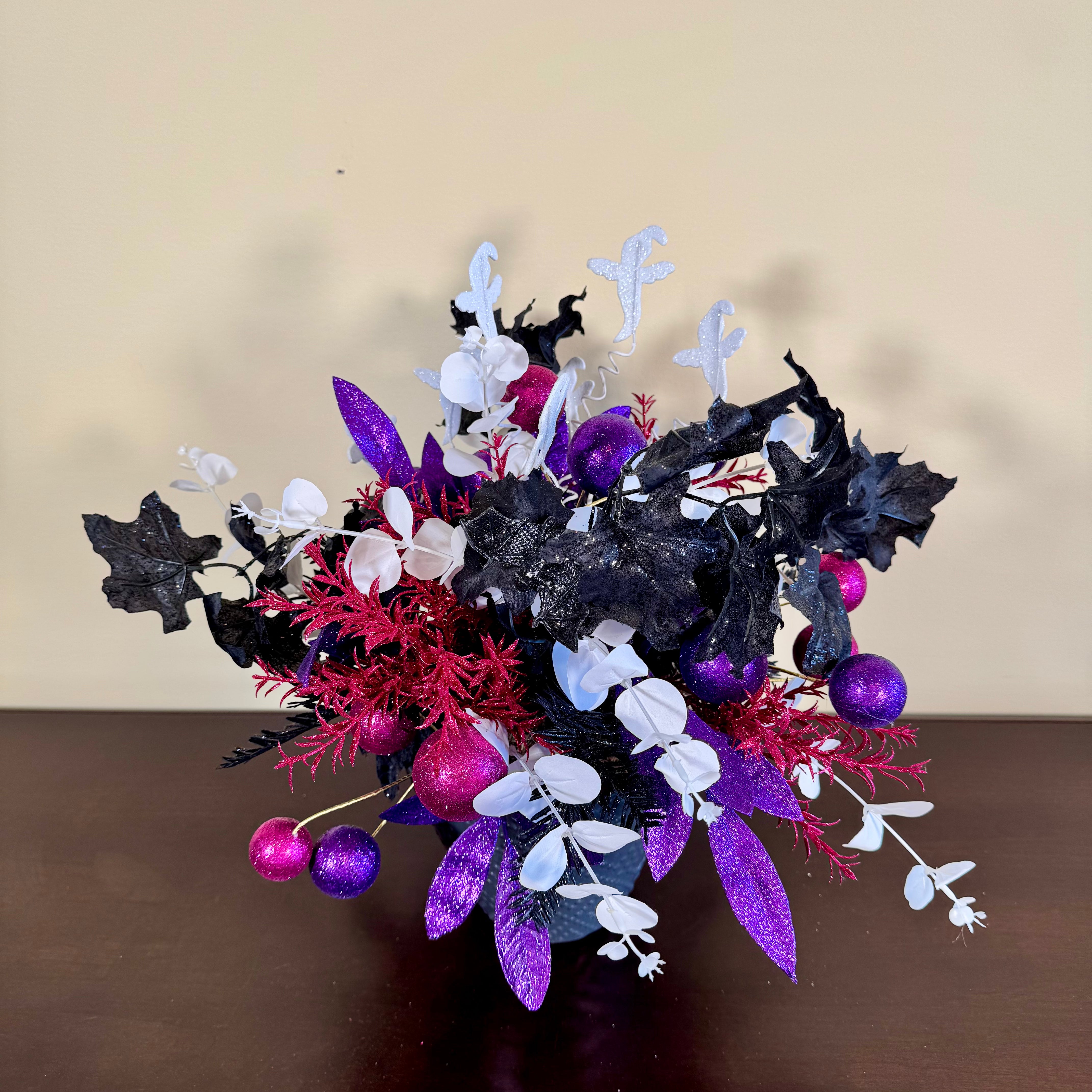 Glam Halloween Arrangement with Ghost Picks, Black Florals & Purple Sparkle Accents
