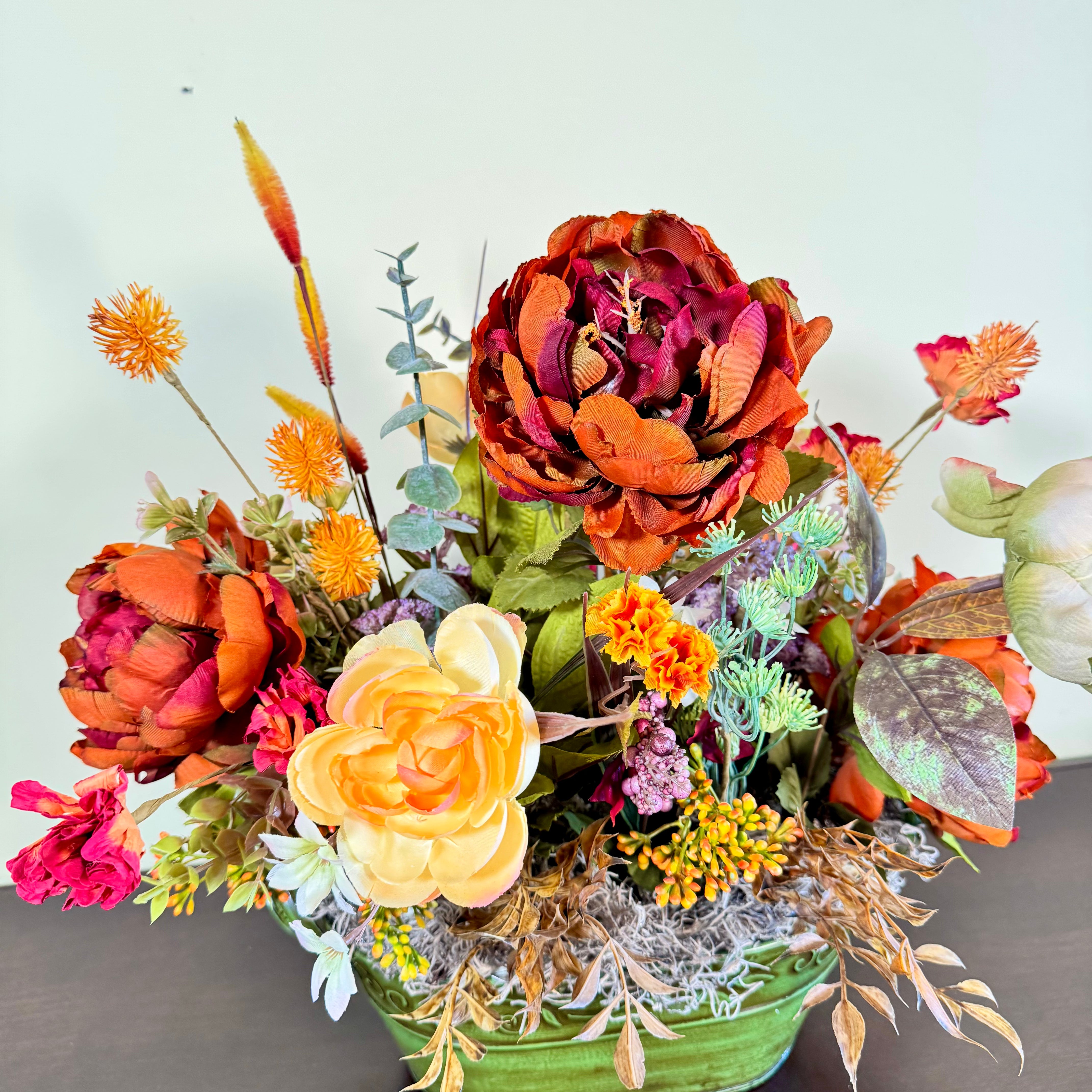 Fall Floral Arrangement with Peonies Roses and Autumn Accents in Green Embossed Tin