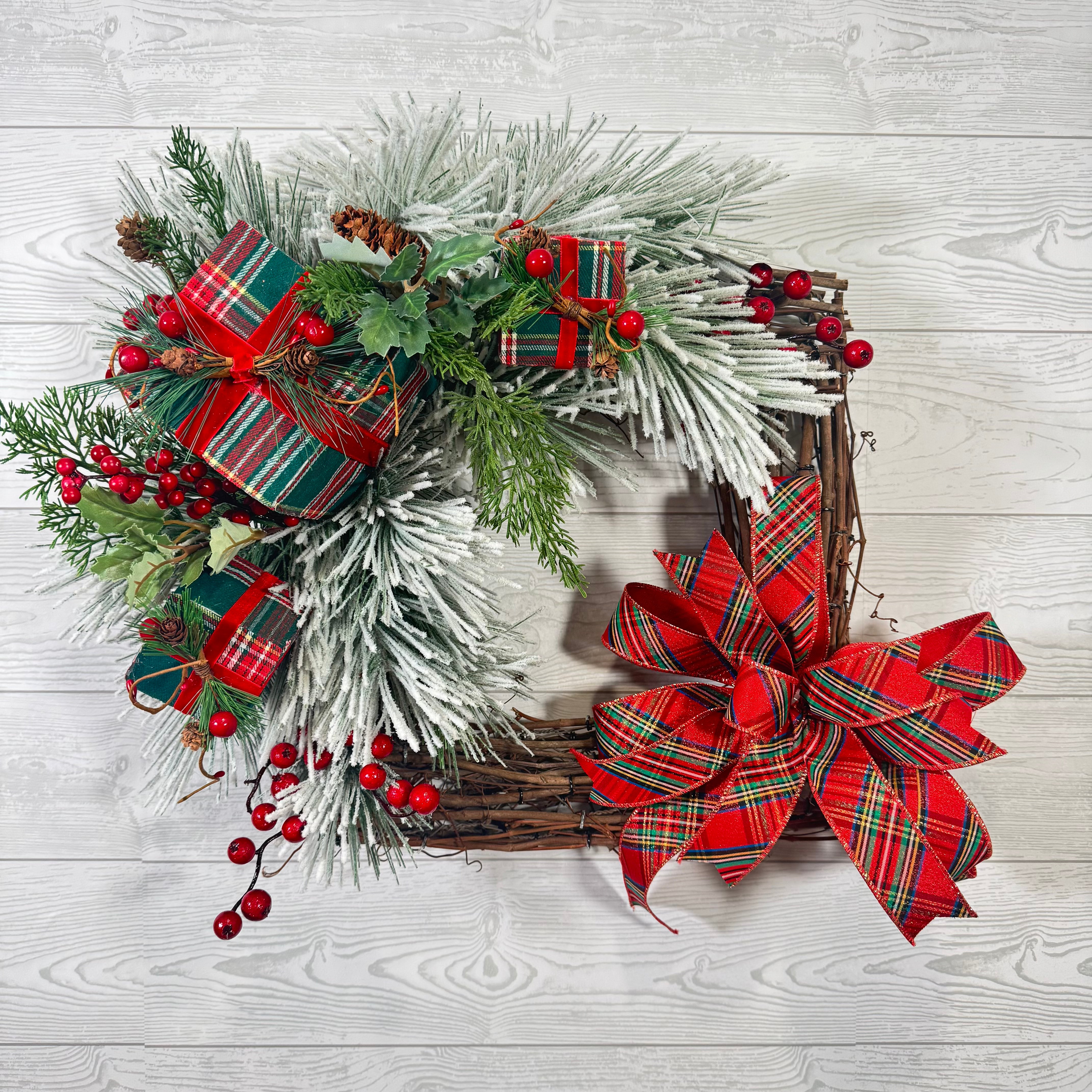 Frosted Evergreen Square Wreath with Red Plaid Bows, Holiday Berries, and Classic Christmas Greens