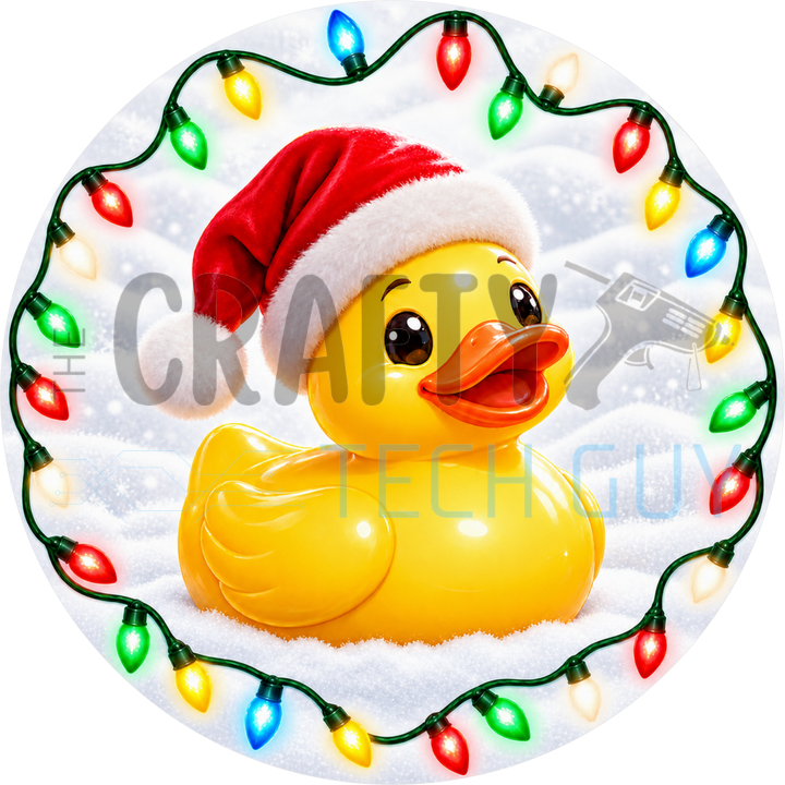 Christmas round wreath sign with a yellow rubber duck in a red Santa hat sitting in snow, ringed by multicolor string lights on a white snow background