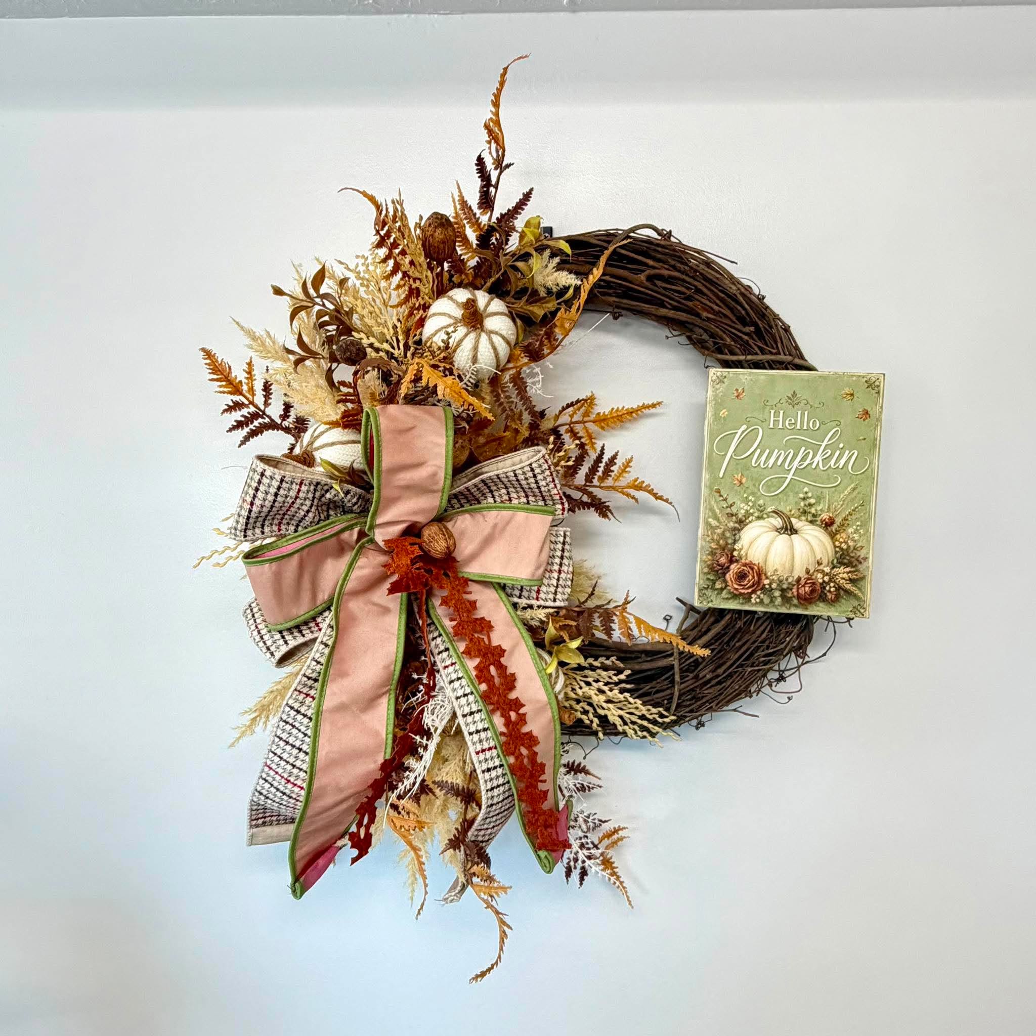Hello Pumpkin sage green sign fall grapevine wreath hanging as front door decor