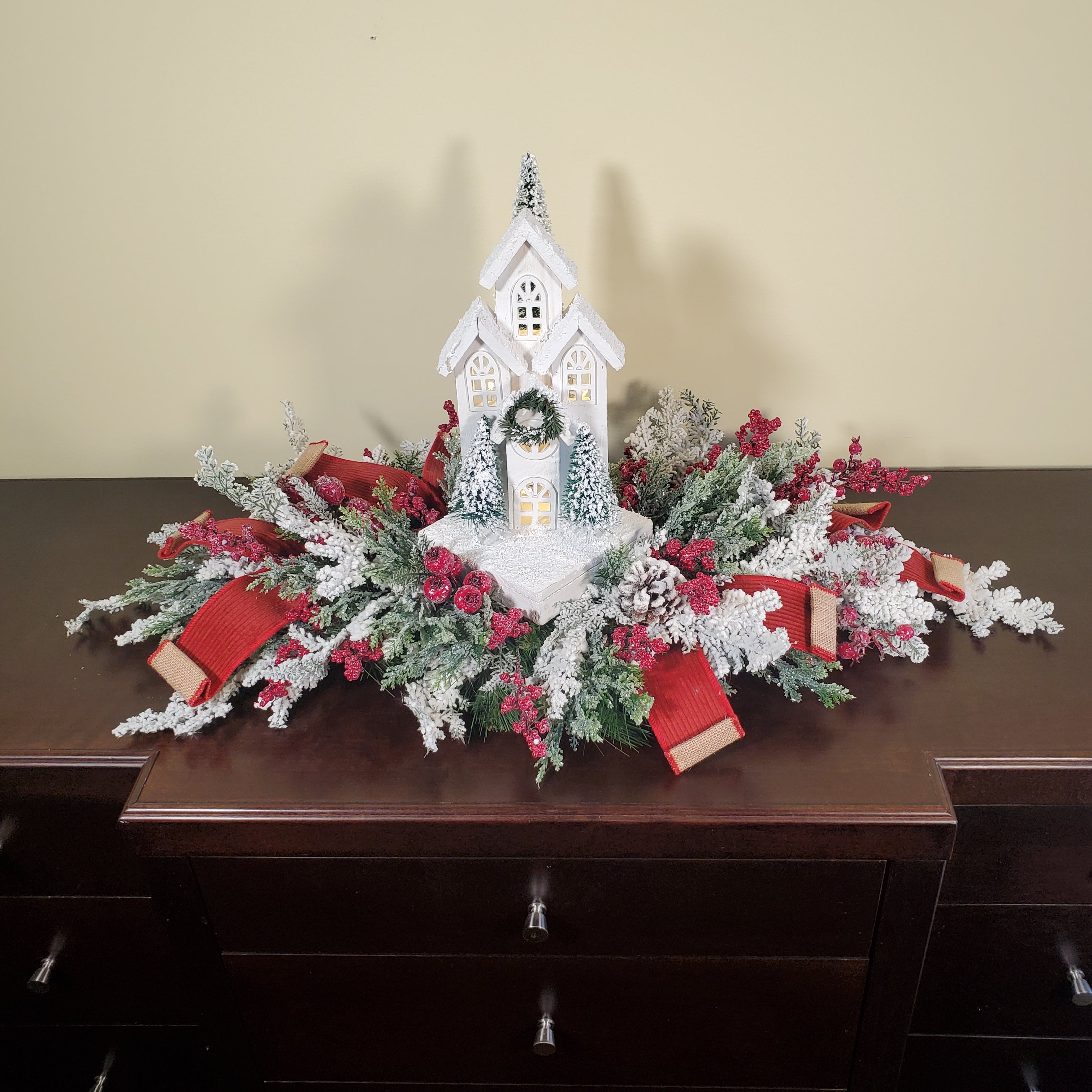 Christmas Centerpiece with White Chapel, Flocked Greenery, Red Berries & Winter Pine Accents