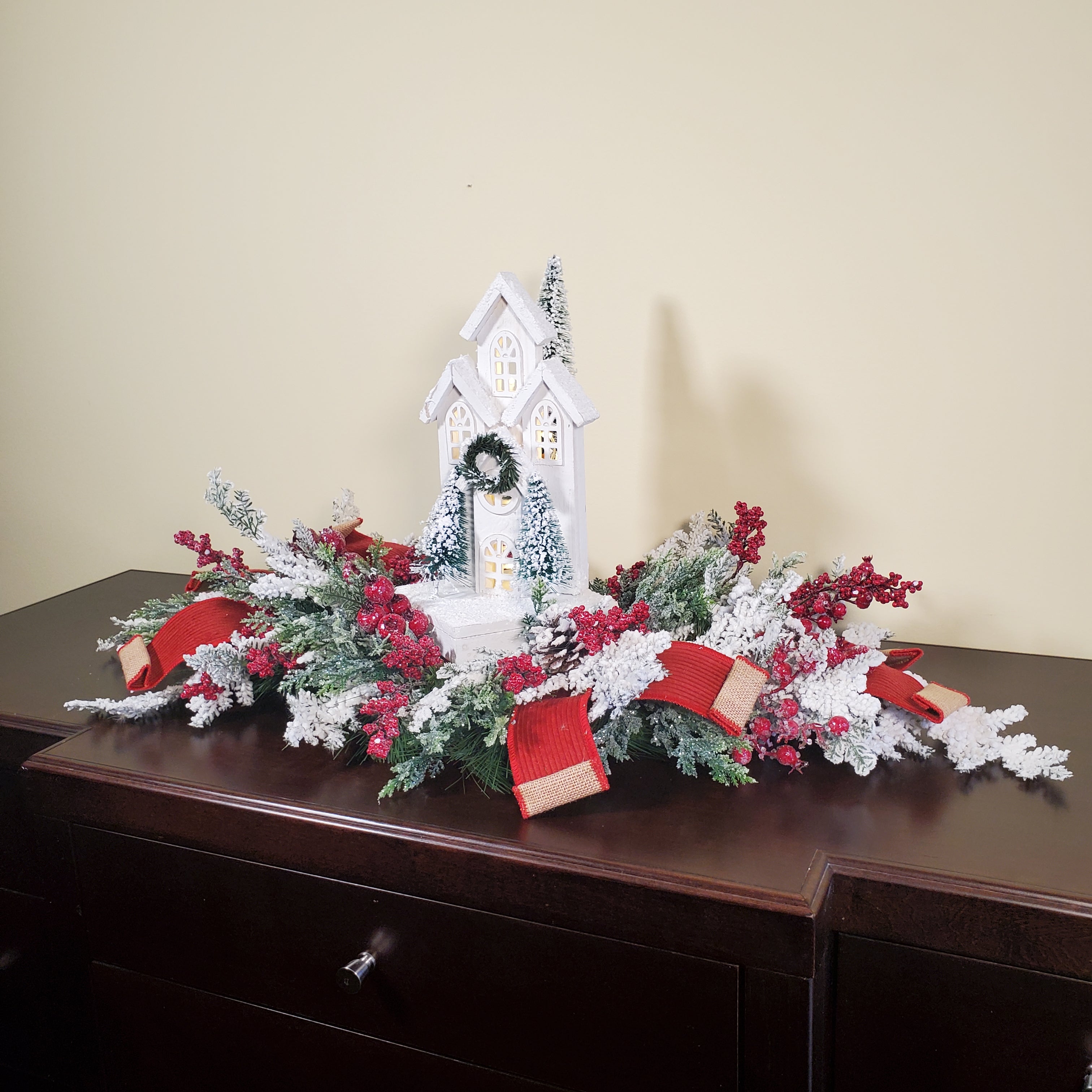 Christmas Centerpiece with White Chapel, Flocked Greenery, Red Berries & Winter Pine Accents