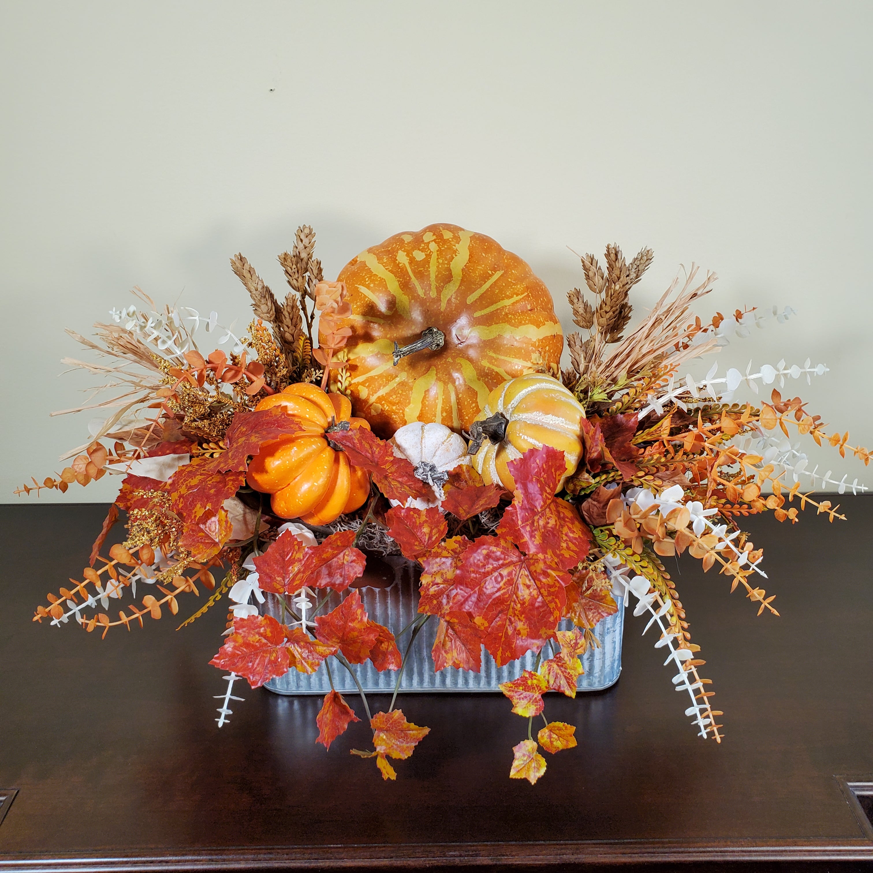 Fall Pumpkin Arrangement with Autumn Leaves, Wheat, and Seasonal Foliage in Rustic Metal Tin