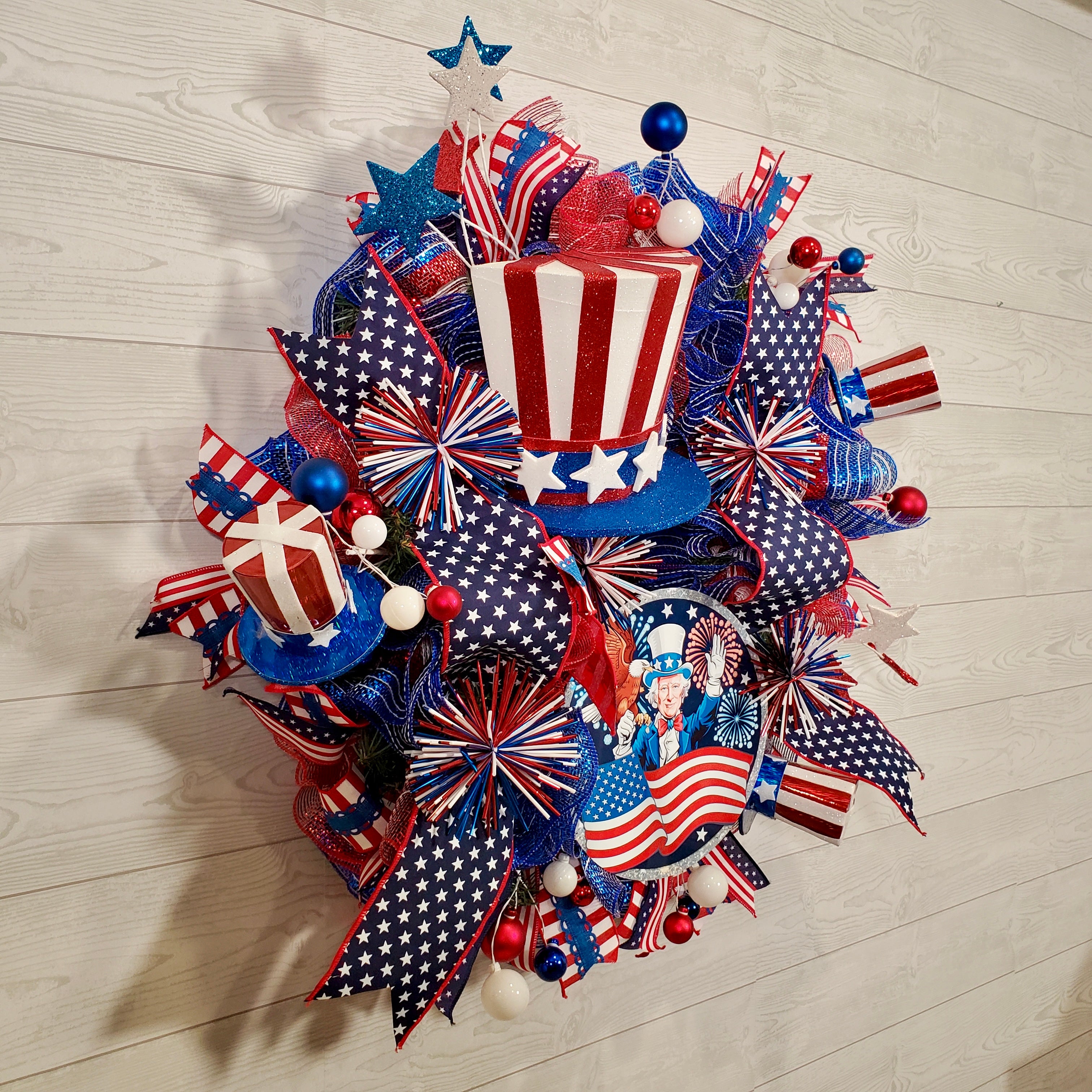 Patriotic Uncle Sam Wreath with Stars, Stripes, Fireworks Ribbons & Red White Blue Décor