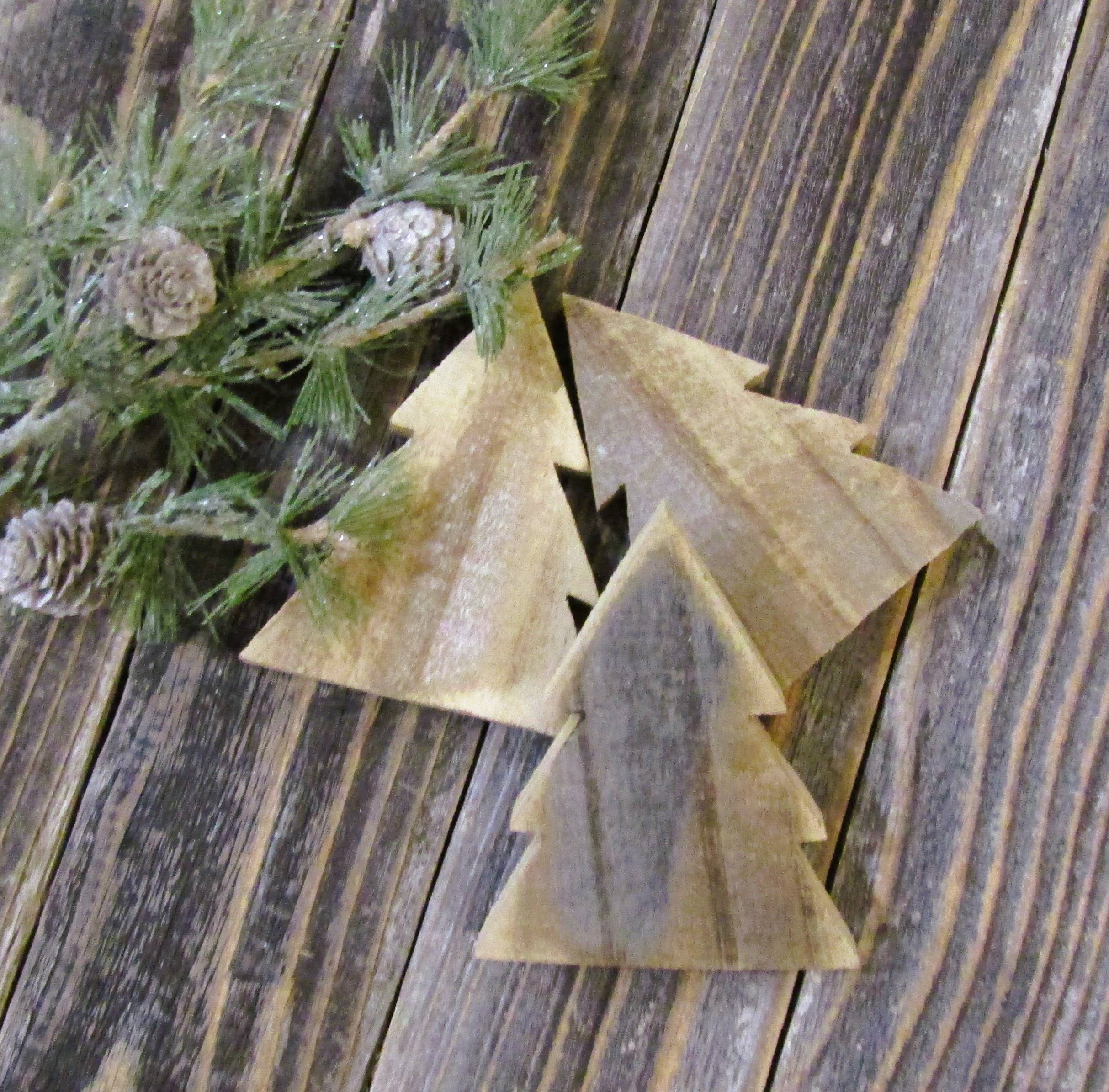 Natural wood Christmas tree bowl fillers showing the raw reclaimed wood grain and pinecones
