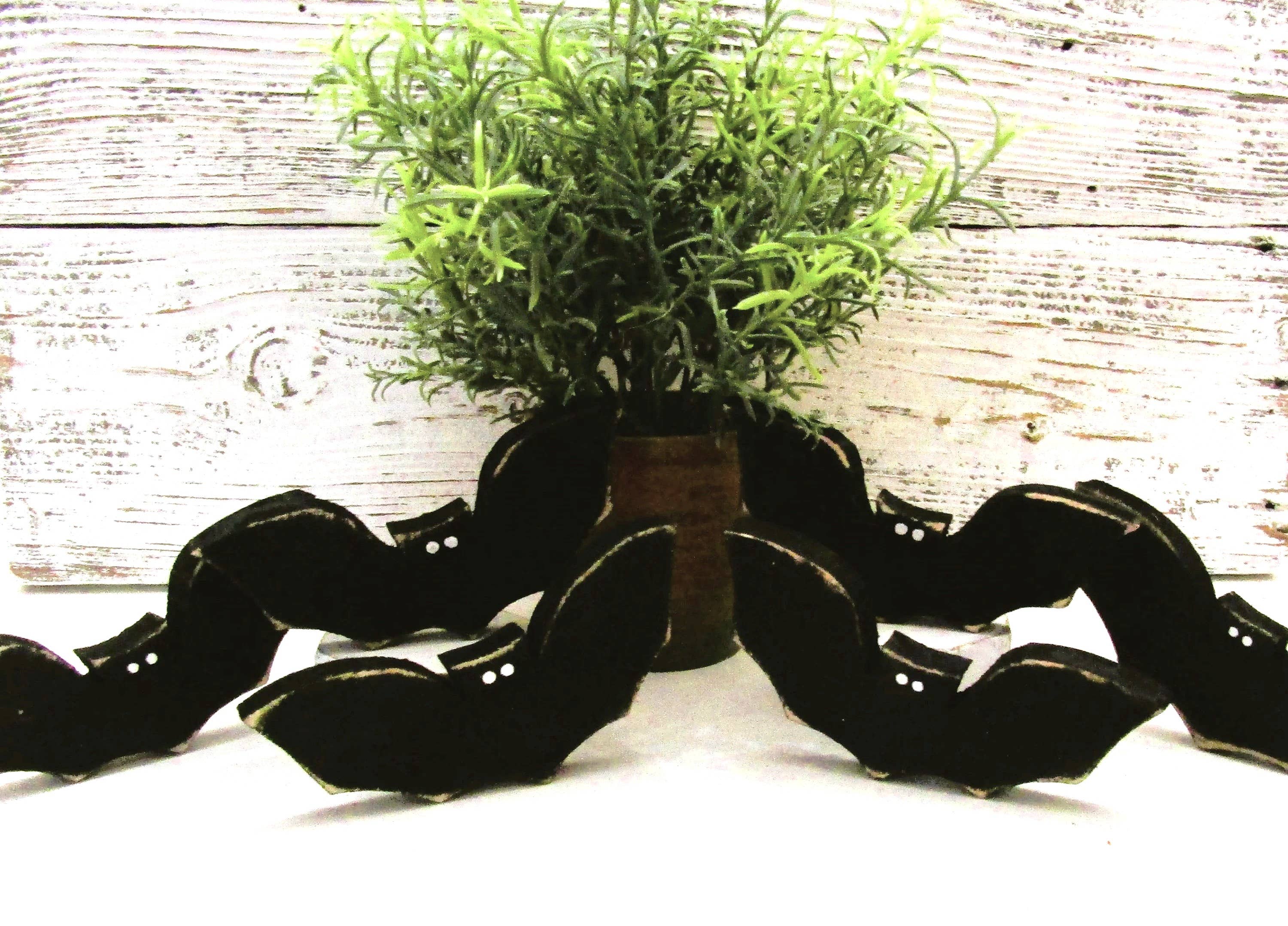 Rustic wood bat Halloween tiered tray decor grouped around a small green plant