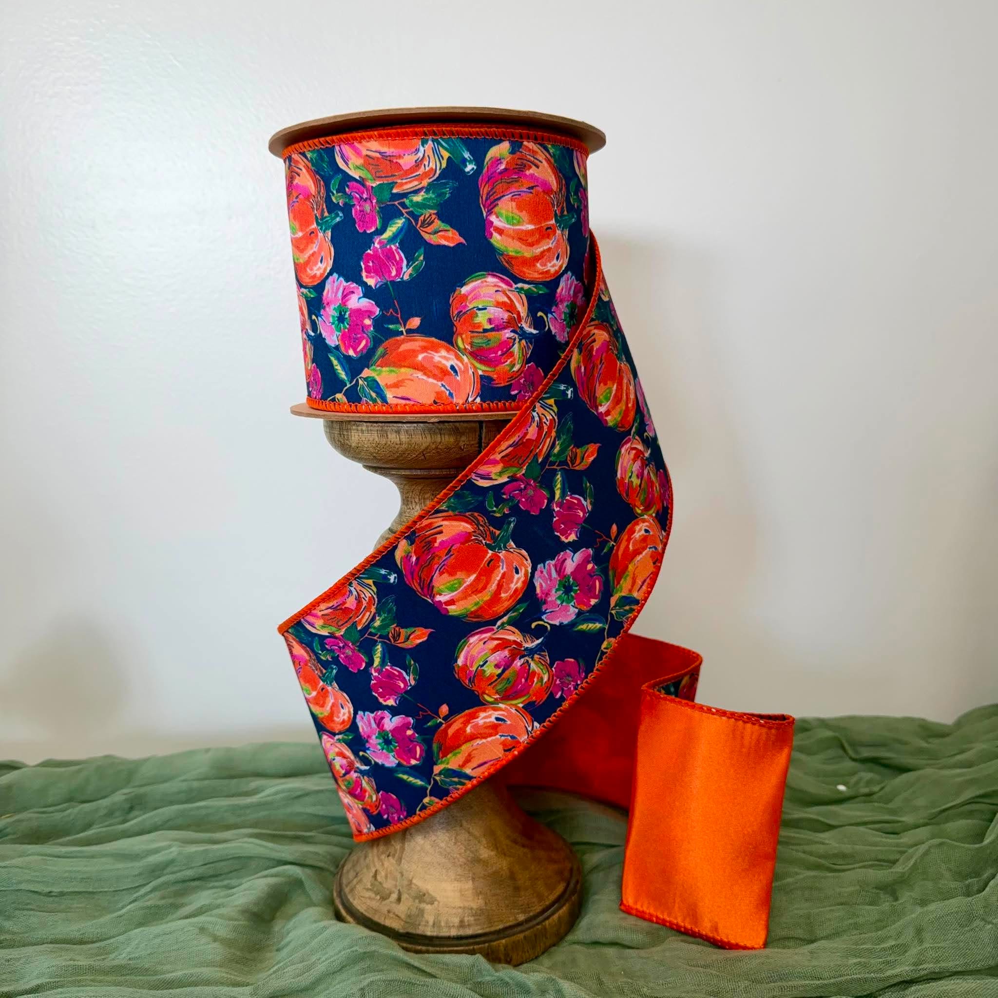 4 Inch 10 Yard Orange Pumpkins and Pink Flowers on Navy Blue Wired Dupioni Ribbon with Satin Orange Backing