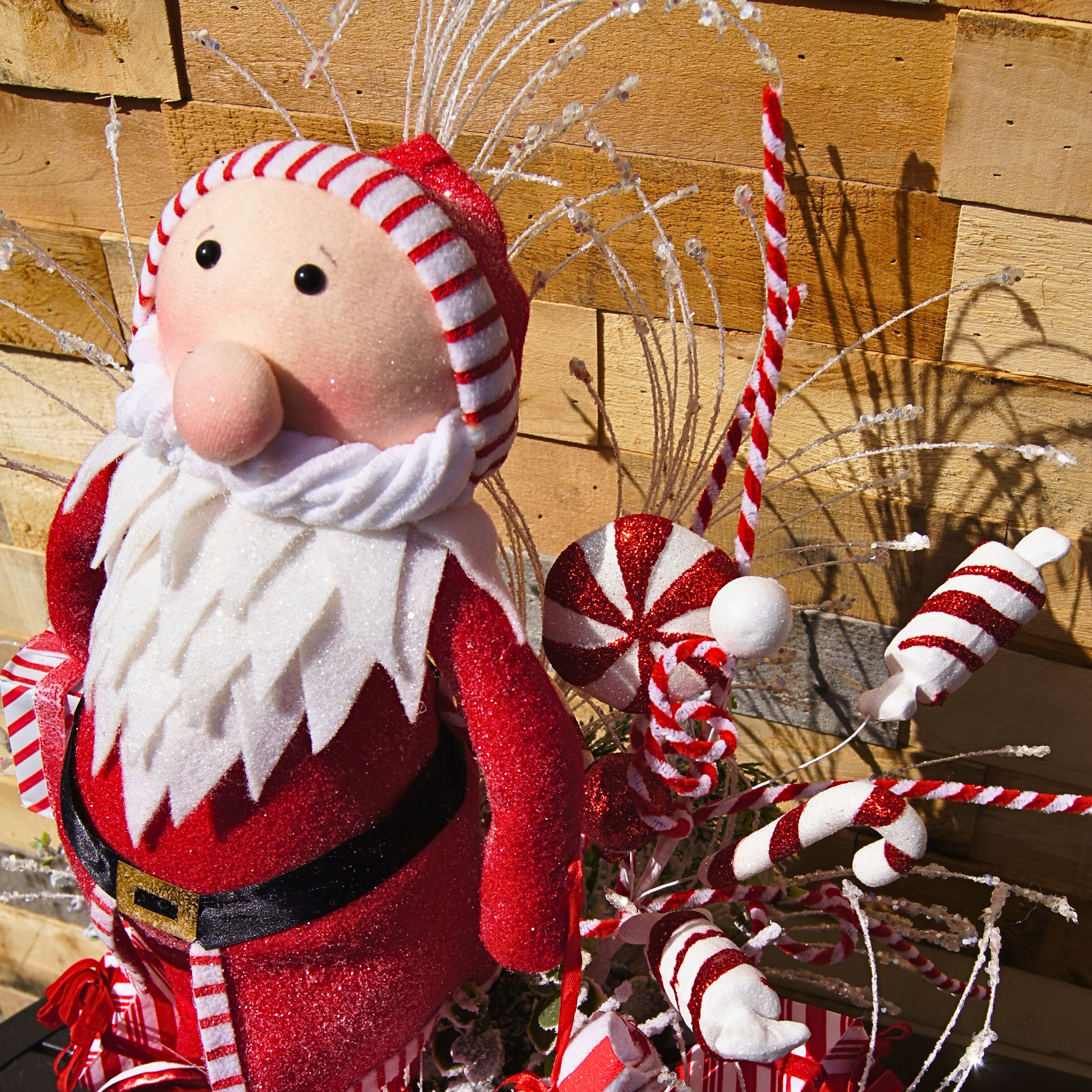 Whimsical Santa Christmas Centerpiece with Candy Cane Accents and Peppermint Gift Details