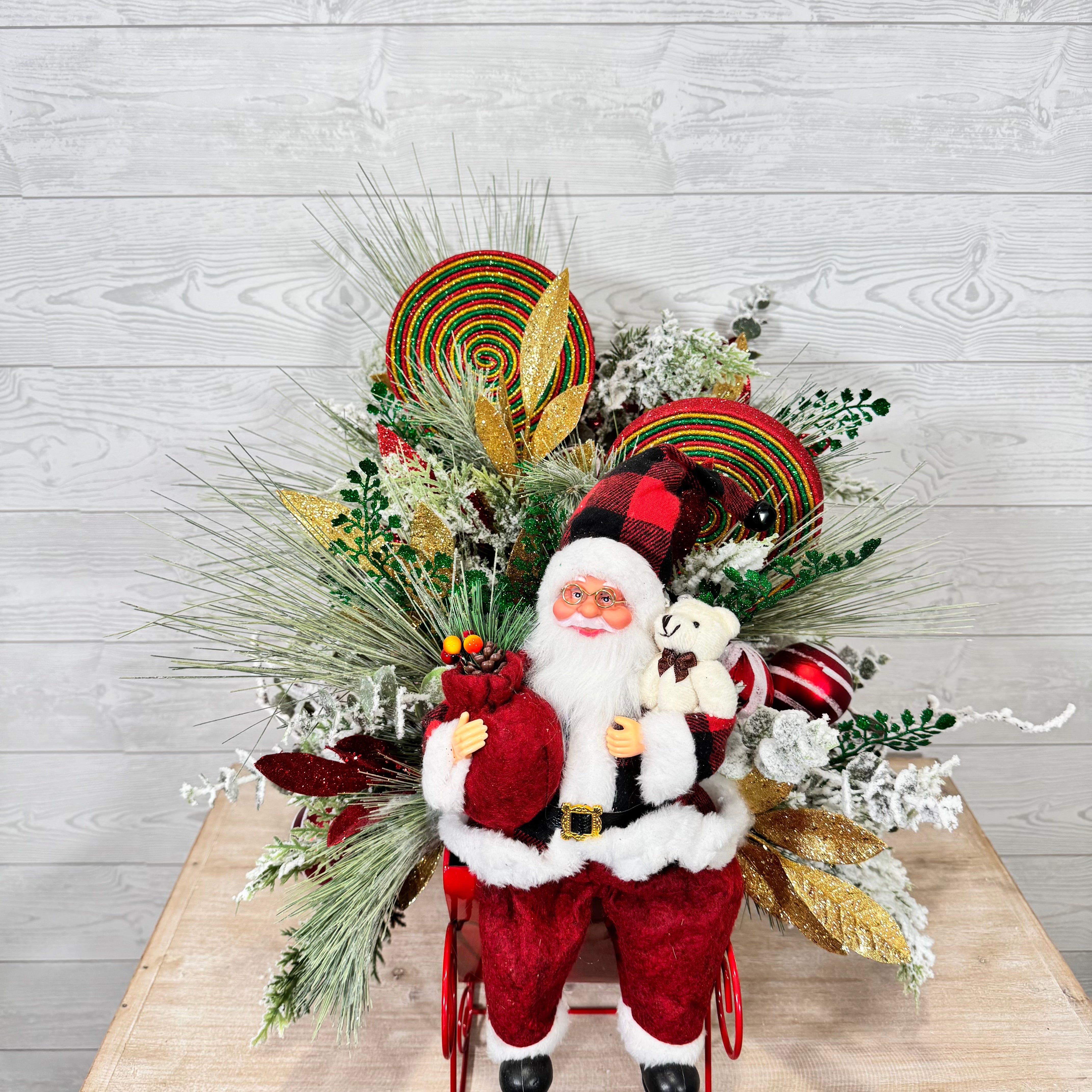 Santa Sleigh Christmas Centerpiece, Whimsical Holiday Arrangement with Plaid Santa, Lollipops & Frosted Greenery
