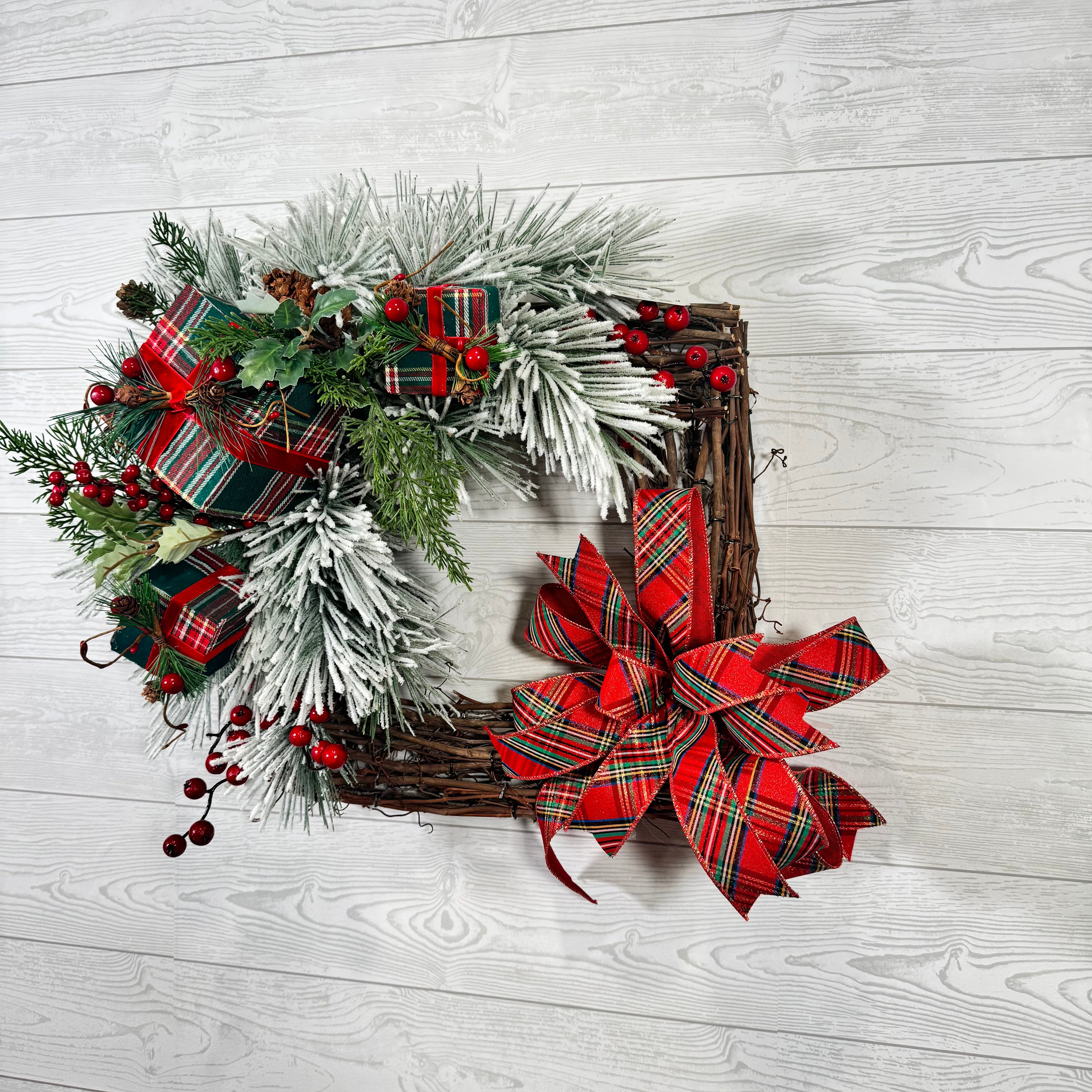 Frosted Evergreen Square Wreath with Red Plaid Bows, Holiday Berries, and Classic Christmas Greens