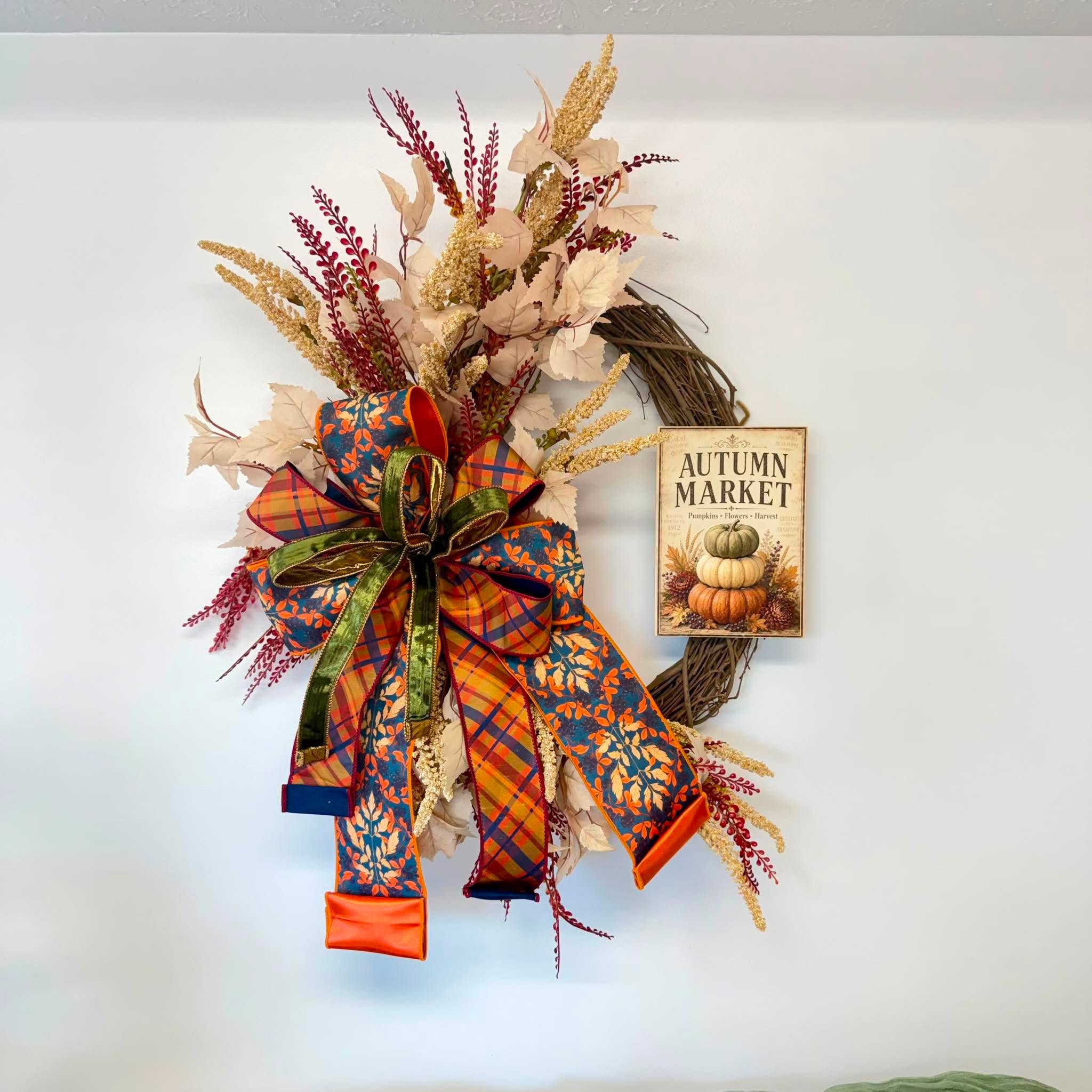 Autumn Market fall grapevine wreath with blush leaves, gold spikes and red berry sprays