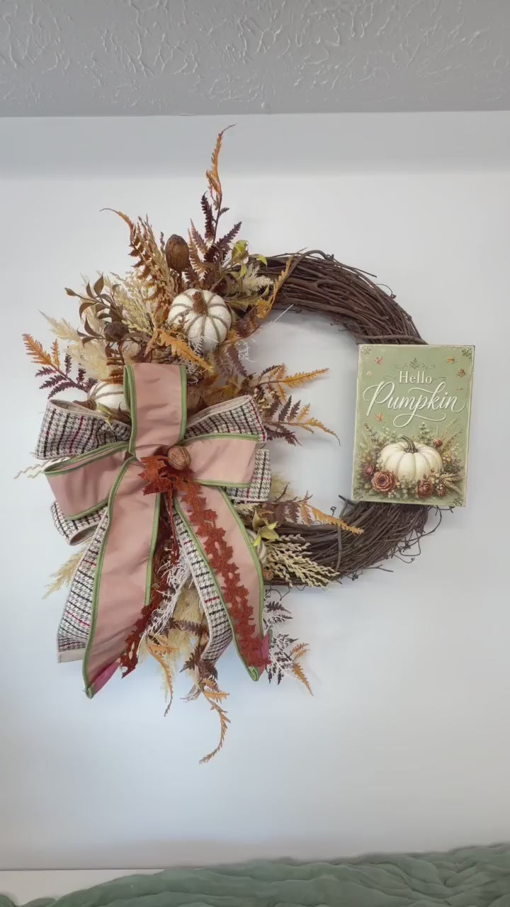 Video of the Hello Pumpkin sage green sign fall grapevine wreath shown from several angles